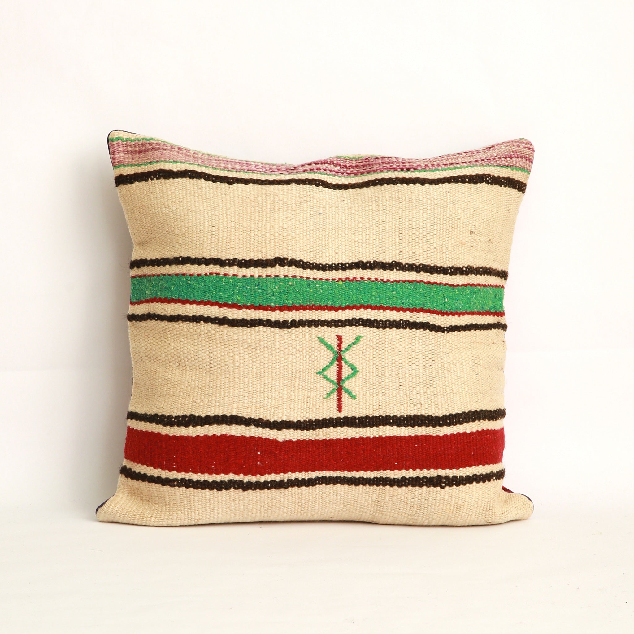 Cuscino realizzato con due tessuti diversi, uno da ogni lato, da questo lato appare  una coperta in lana vintage a righe  nere verde acqua e bordeaux con un simbolo Amazigh (berbero) ricamato a mano