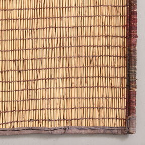 angolo di una stuoia tuareg in legno di palma chiaro