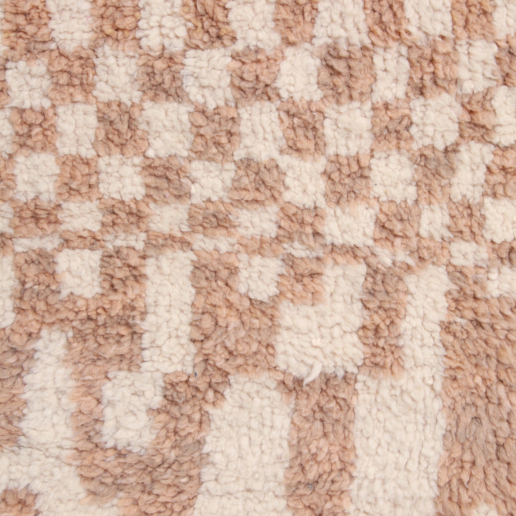 dettaglio della lana morbida e corta di un tappeto beni ourain