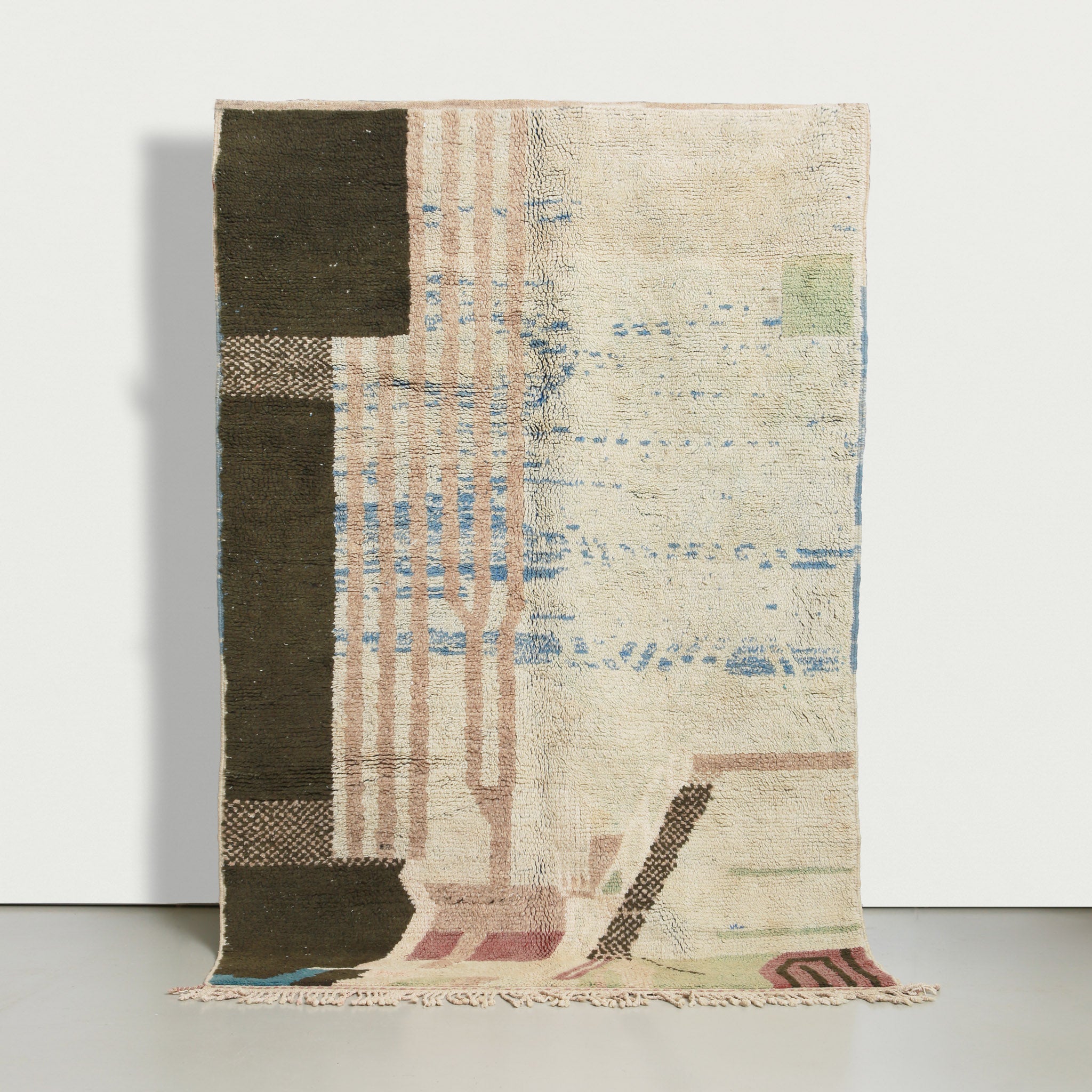 Vintage Beni Mrirt rug with minimalist design featuring olive green geometric shapes on natural wool background with blue,pink,sauge green accents