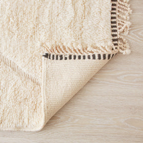 retro di un tappeto beni mrirt che evidenzia la qualità e la precisioni dei nodi