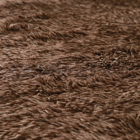 dettaglio della lana di colore marrone non tinta del tappeto