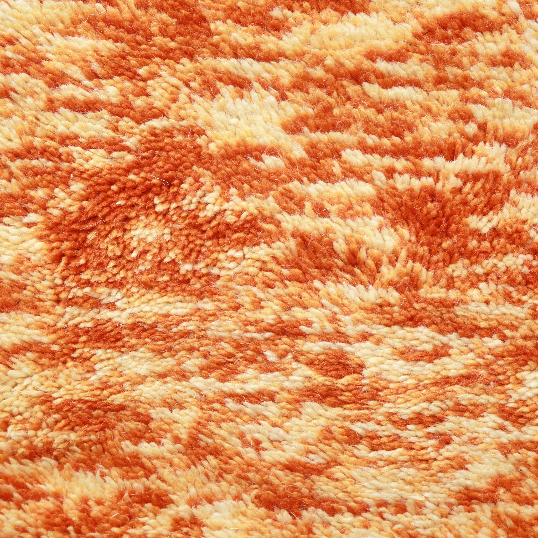 primo piano del dei peli di lana con varie sfumature di arancione